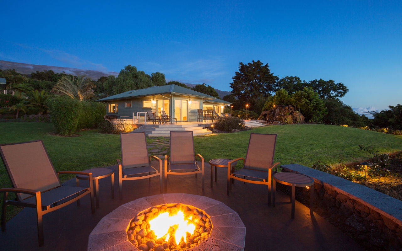 Elegant patio with decorative concrete and fire pit.