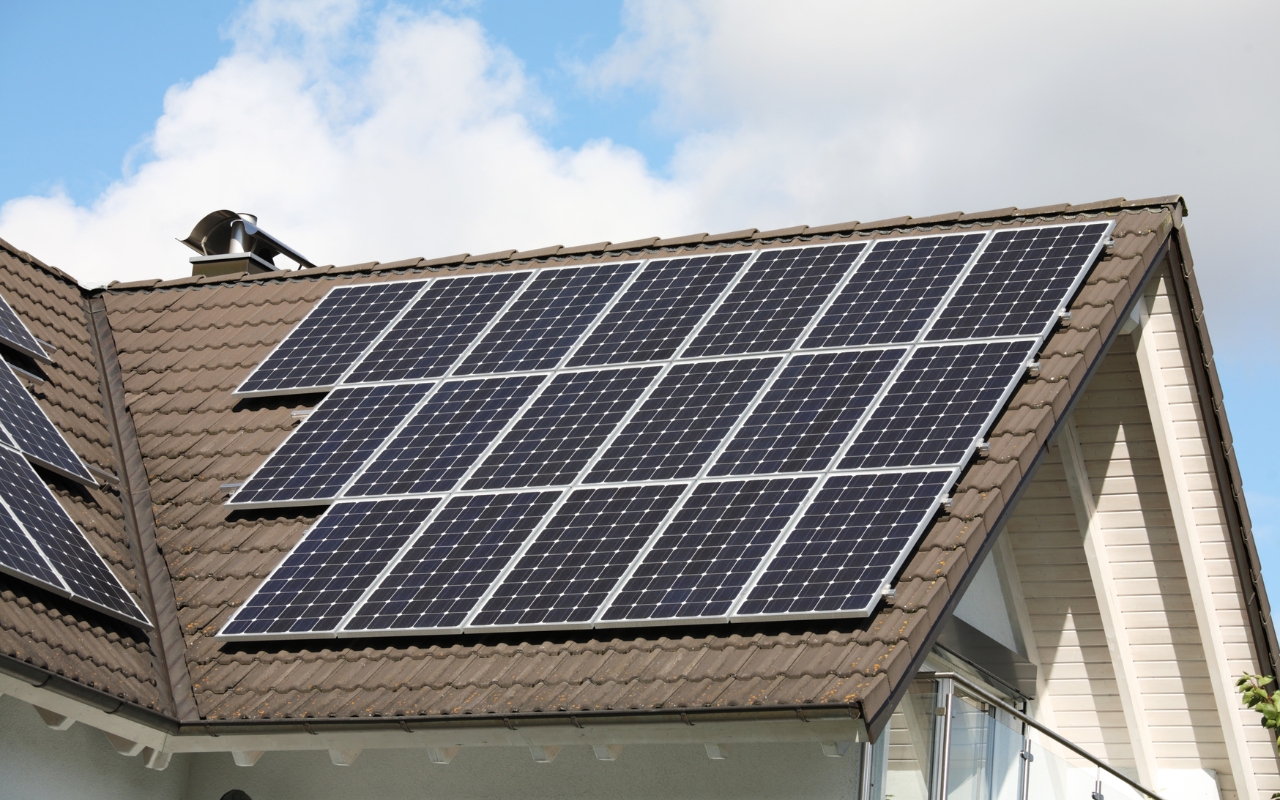 Solar panels on a flat roof maximizing energy efficiency.